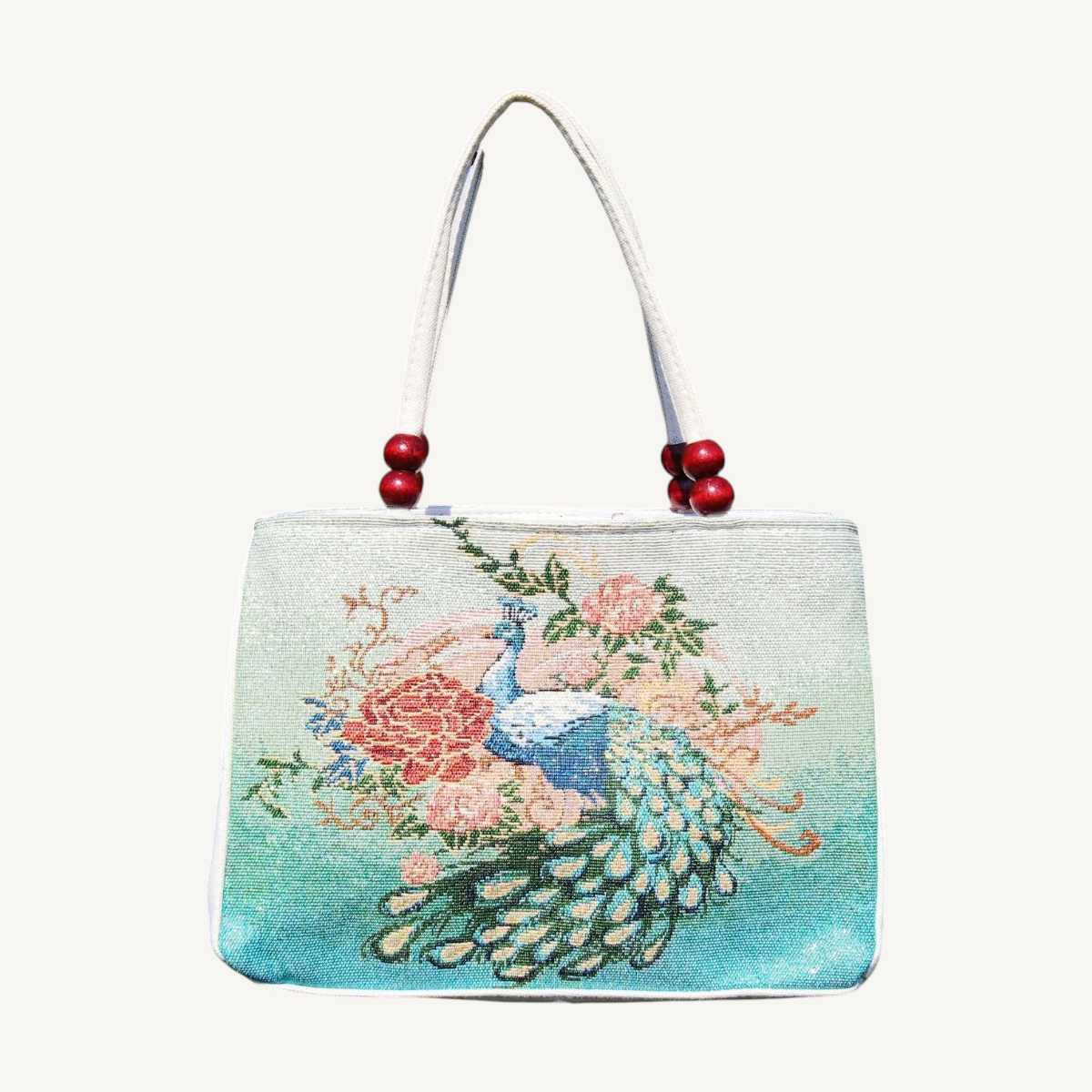 Embroidered tote — green peacock variant, front view on light background