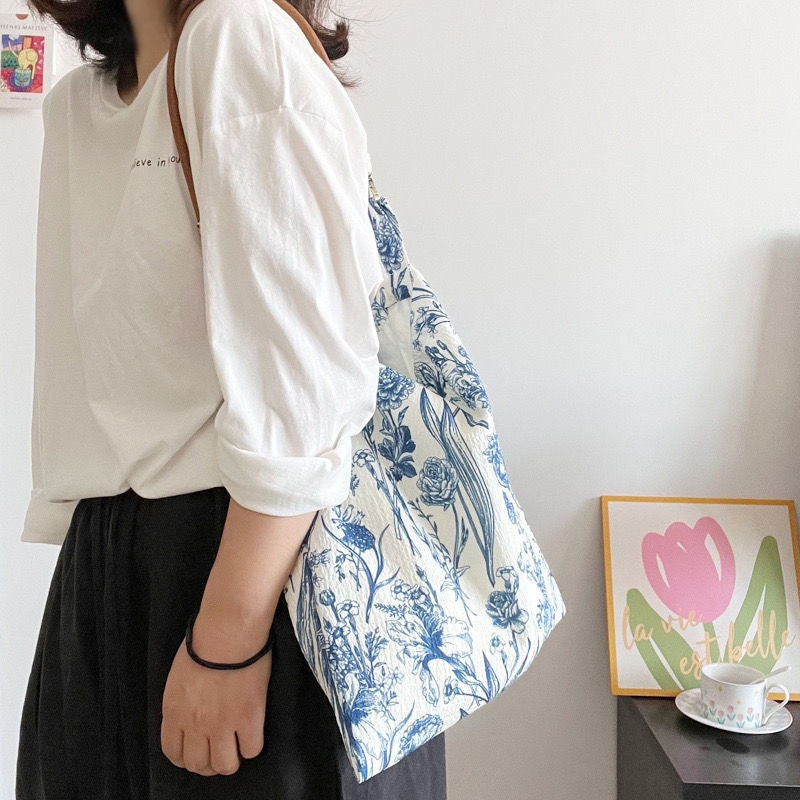 Porcelain Garden Tote — worn or held by a model, supplier photograph