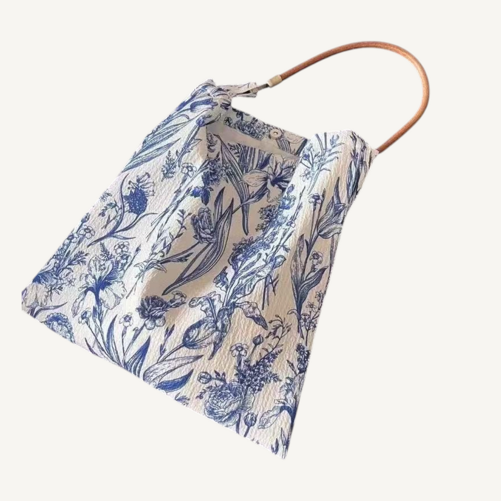 Porcelain Bloom Shoulder Bag — angled view on light background