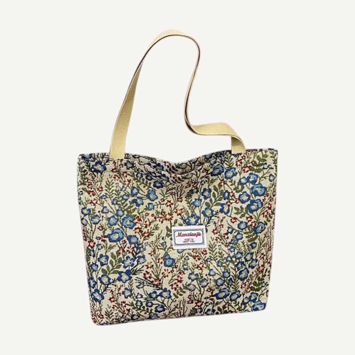 Ditsy Garden Zip Tote — blue floral, front view on light background