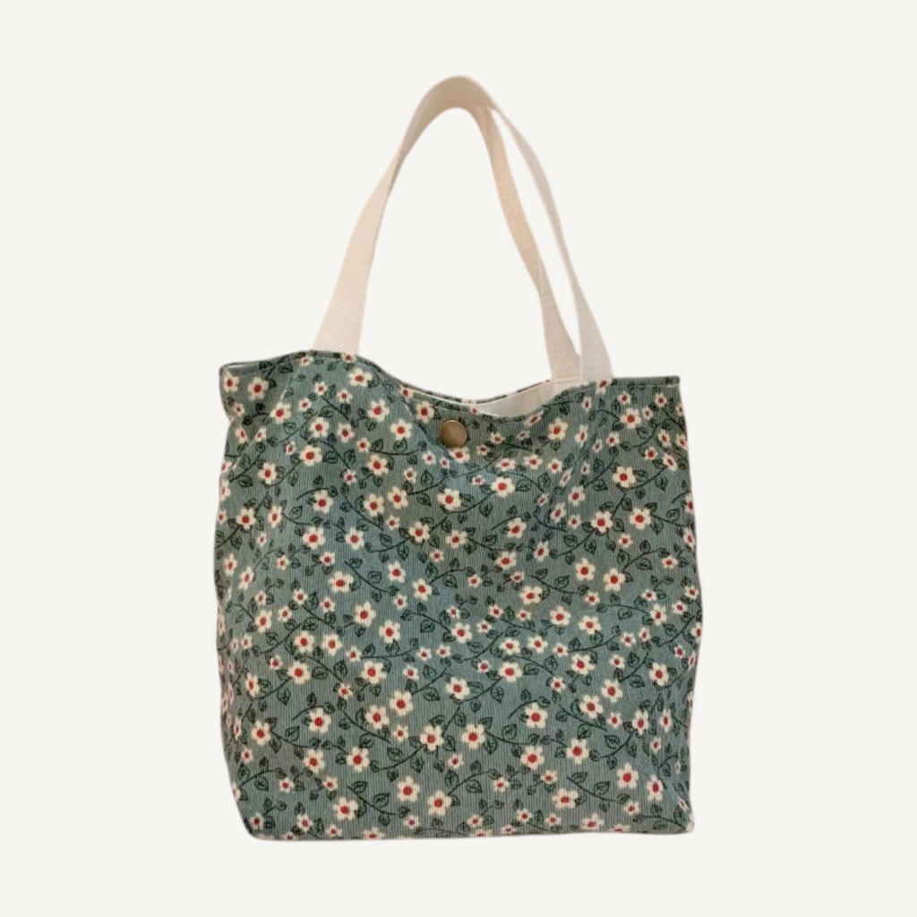 Cottage Rose Mini Tote — green floral, front view on light background