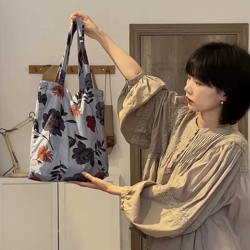 Autumn Botanical Tote — worn or held by a model, supplier photograph