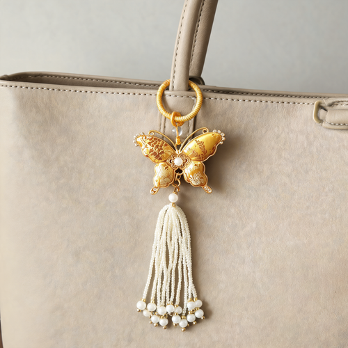 Brocade Butterfly Beaded Bag Charm — lifestyle styling | Mak&Malva gallery 1-3