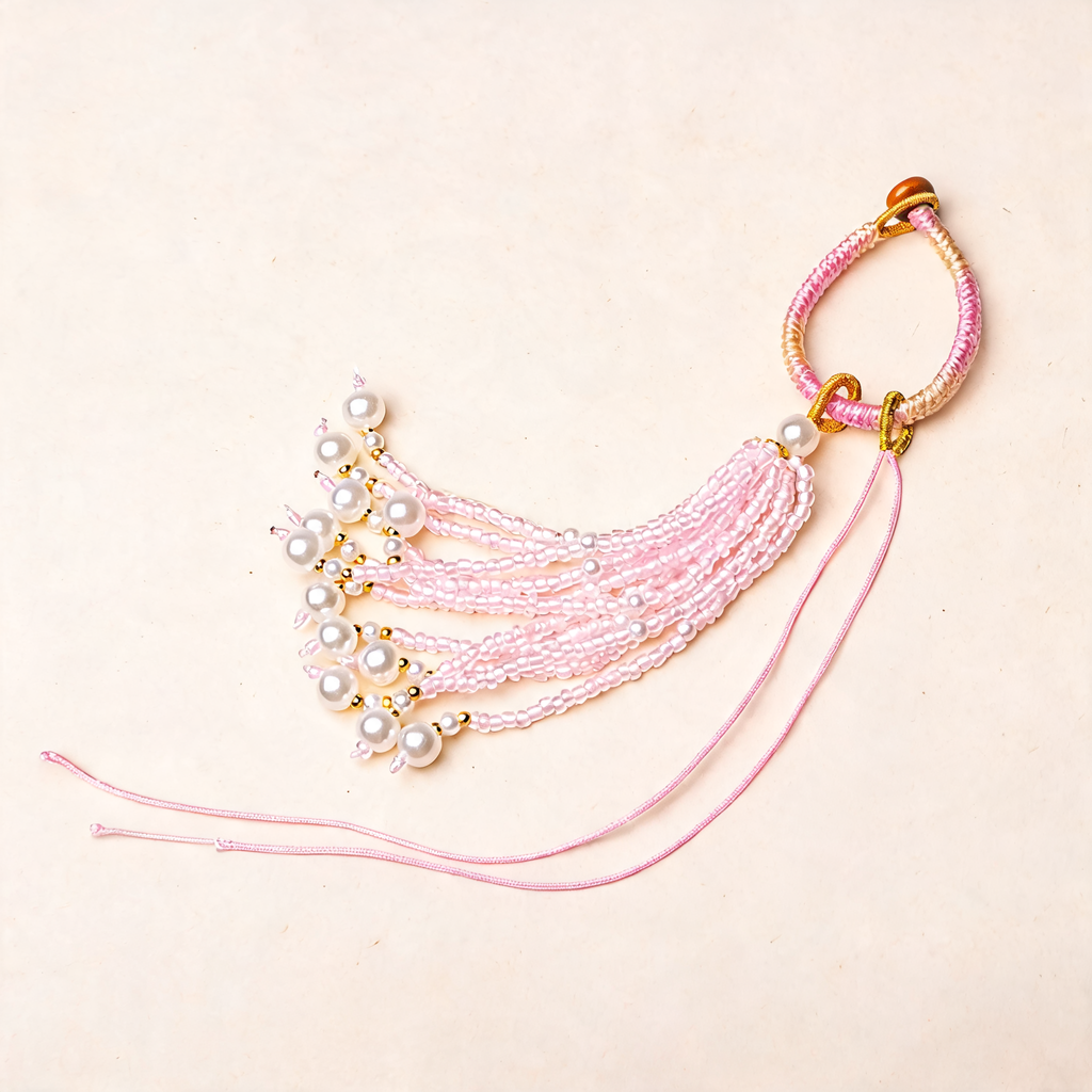Knotted Bead Tassel Bag Charm — three-quarter product view | Mak&Malva gallery 1-3