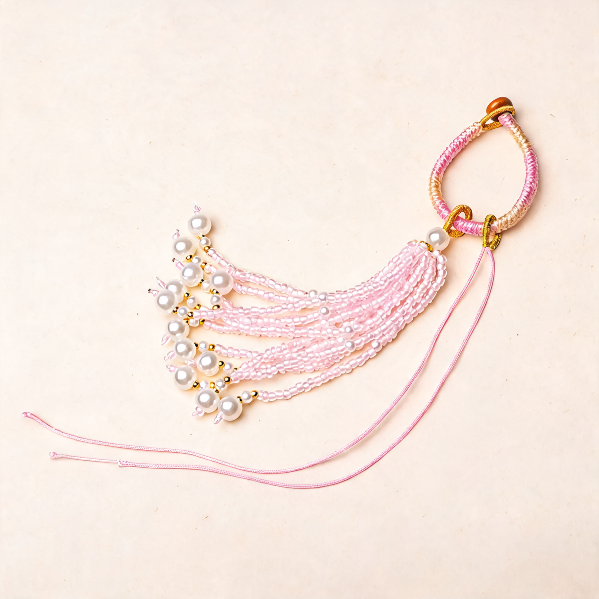 Knotted Bead Tassel Bag Charm — three-quarter product view | Mak&Malva gallery 1-3