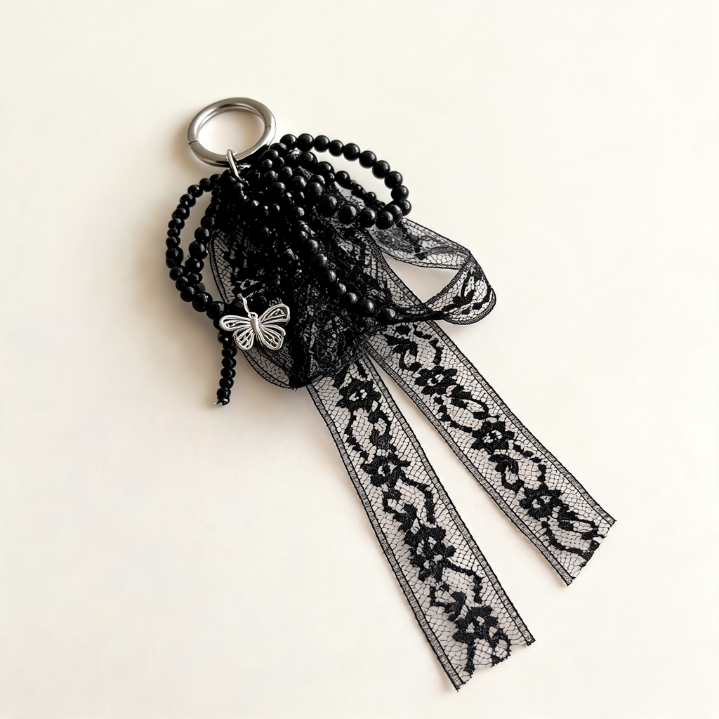 Lace Bow Bag Charm — three-quarter product view | Mak&Malva gallery 1-3