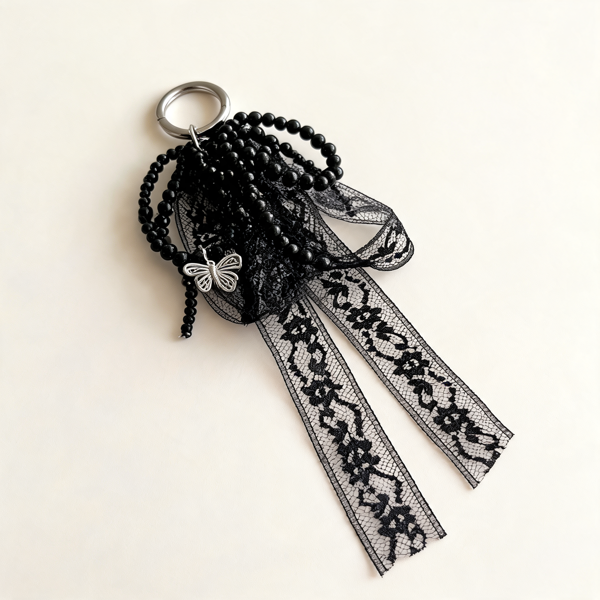 Lace Bow Bag Charm — three-quarter product view | Mak&Malva gallery 1-3