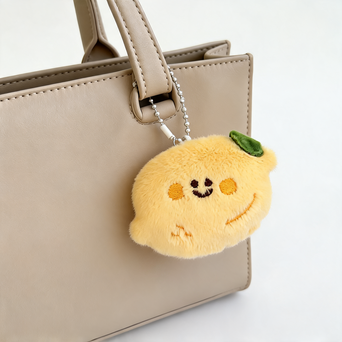 Little Lemon Plush Bag Charm — lifestyle styling | Mak&Malva gallery 1-3