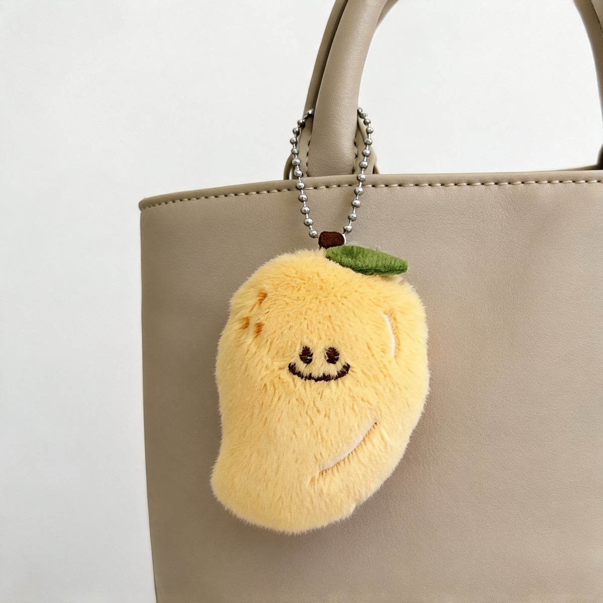 Little Mango Plush Bag Charm — lifestyle styling | Mak&Malva gallery 1-3