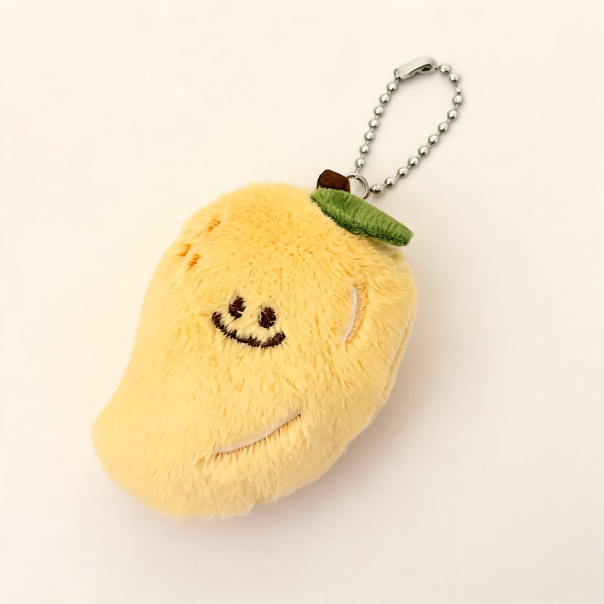 Little Mango Plush Bag Charm — three-quarter product view | Mak&Malva gallery 1-3