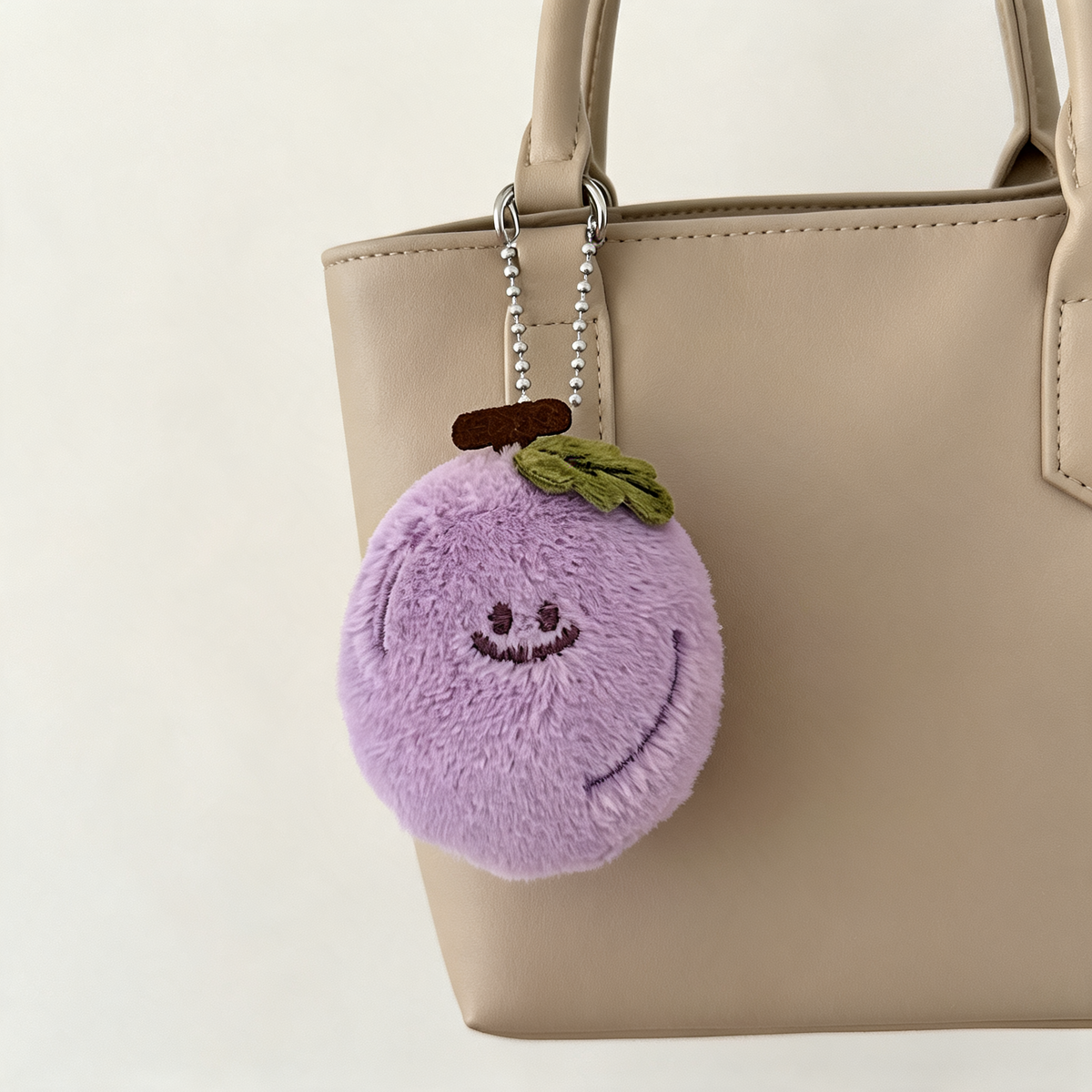 Little Grape Plush Bag Charm — lifestyle styling | Mak&Malva gallery 1-3