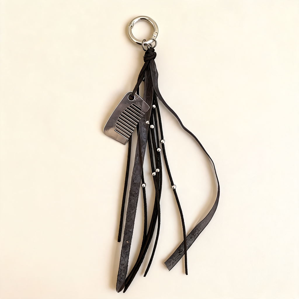 Long Fringe And Comb Bag Charm — three-quarter product view | Mak&Malva gallery 1-3